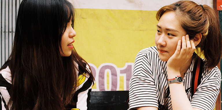 Two girls are talking